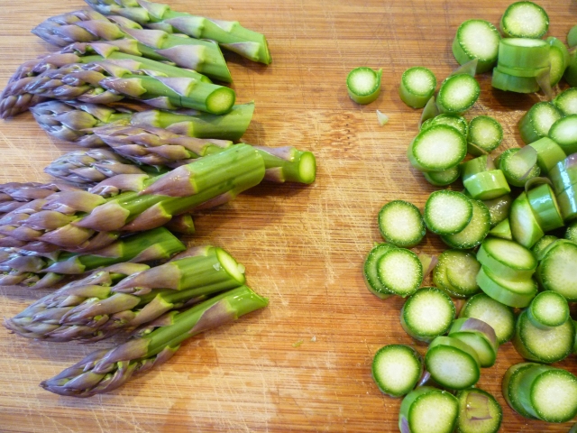 In a large pot of boiling water, blanch the asparagus by cooking for 2 ...